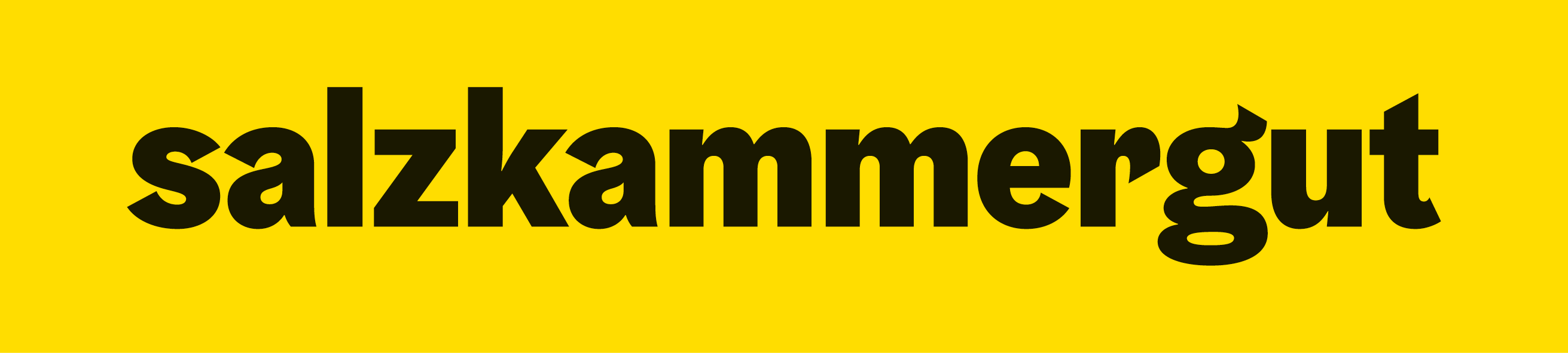 This image shows the word "salzkammergut" written in bold black lowercase letters against a bright yellow background. Salzkammergut is a famous resort area in Austria known for its mountains and lakes, and this appears to be a simple but striking typographic treatment of its name.